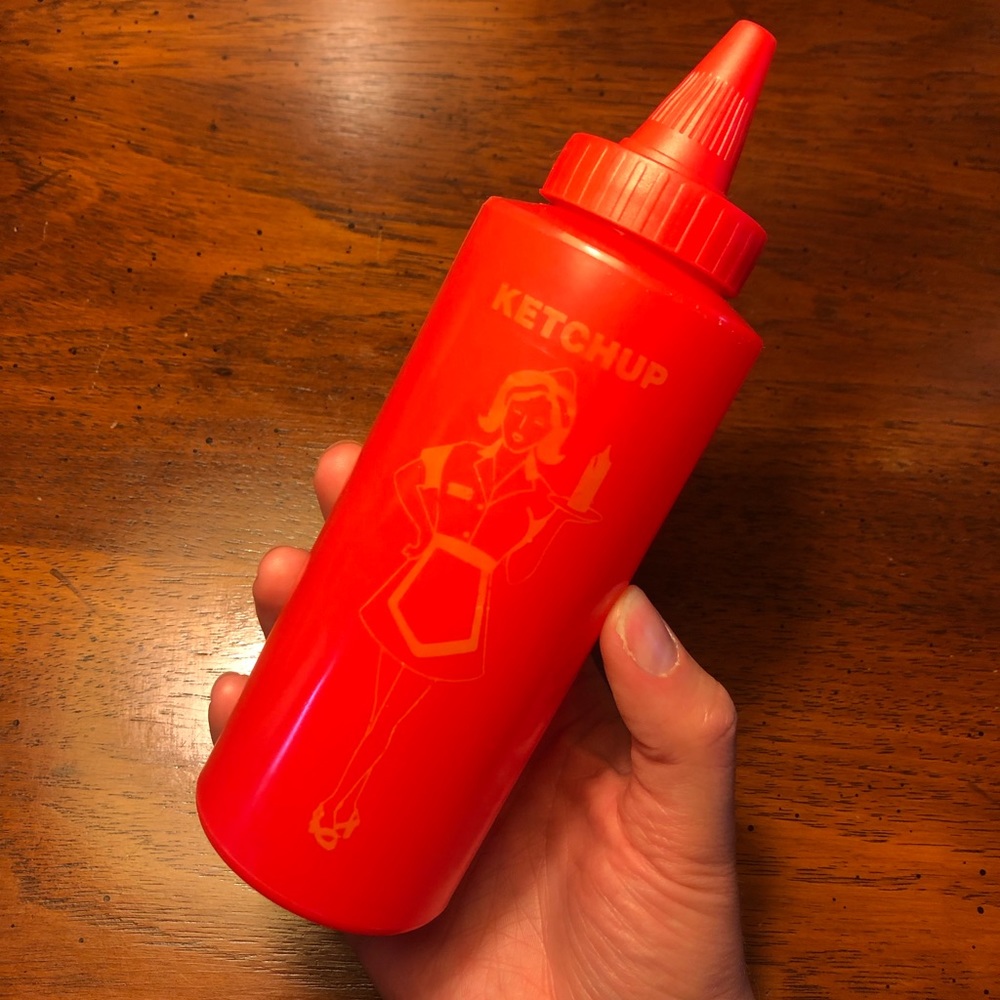 Vintage Retro Red Plastic Ketchup Bottle With Print of Server